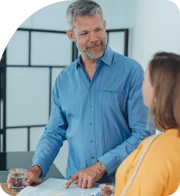 A policyholder signing a renewal with an adviser
